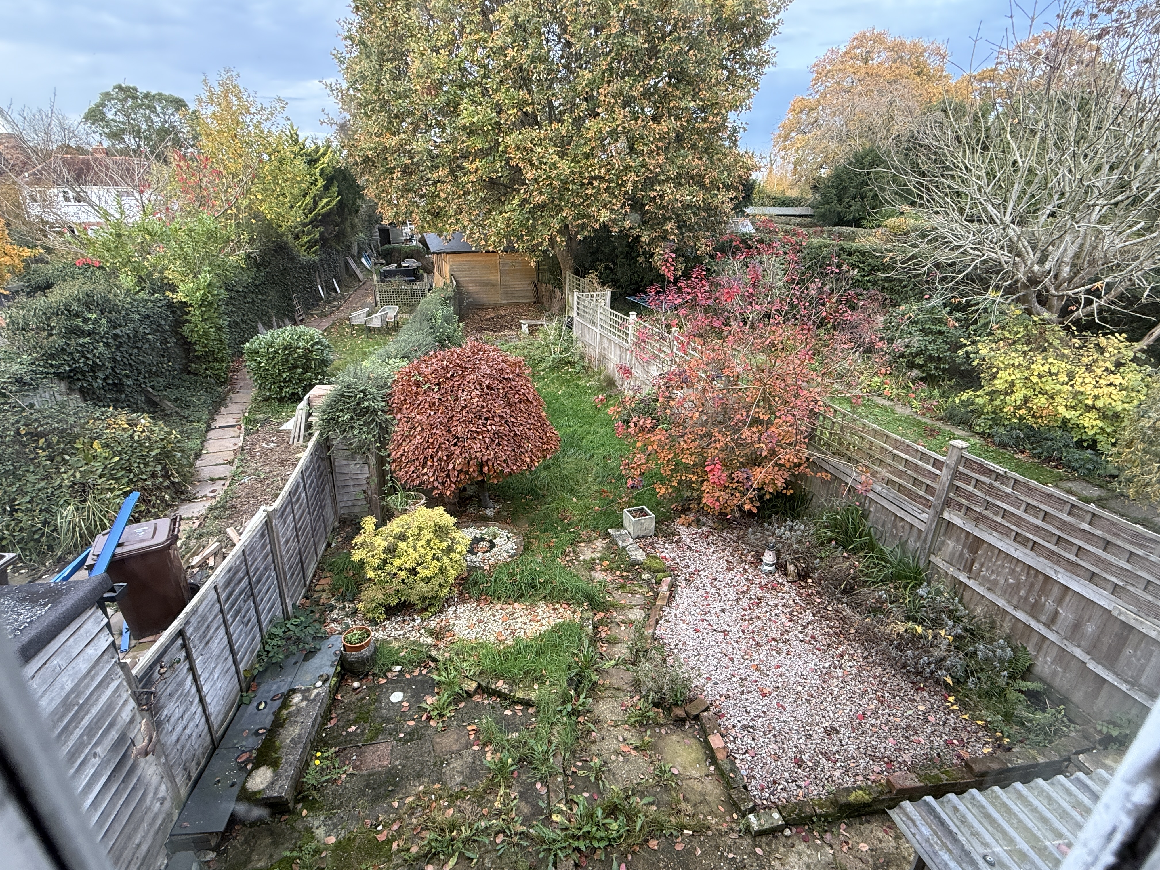 Lot: 59 - HOUSE IN NEED OF IMPROVEMENT IN WEALDEN VILLAGE - View of rear garden from Period Cottage for Improvement